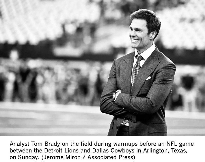 Analyst Tom Brady on the field during warmups before an NFL game
